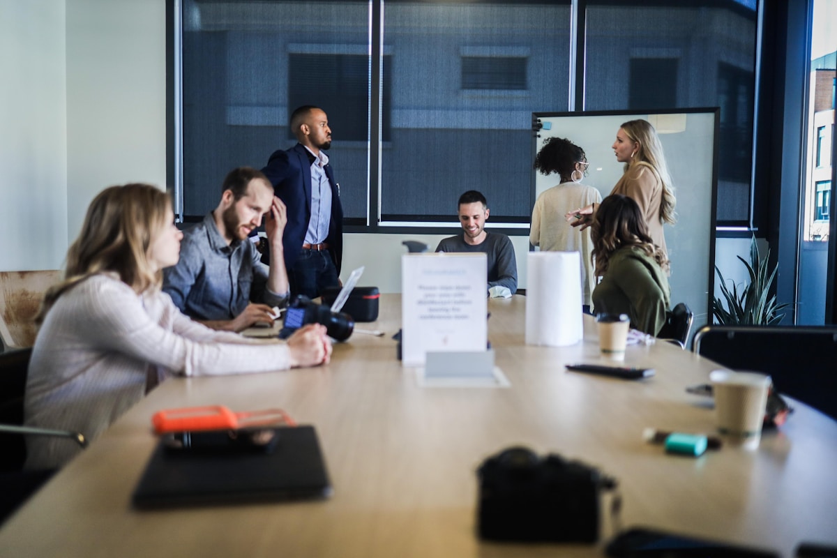 An HR and finance team meeting in a conference room